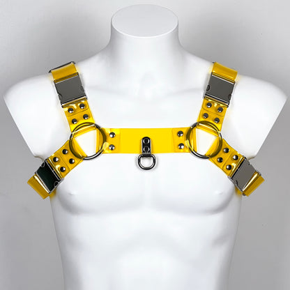 BDSM harness in yellow transparent PVC with metallic buckles