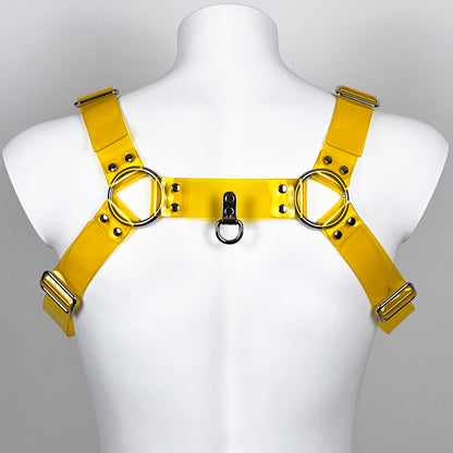 BDSM harness in yellow transparent PVC with metallic buckles